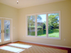 Interior complete.  French doors with prairie grids.  Large 3 panel window. 