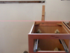 We use a laser to set our cabinets so everything is perfectly level and plumb.